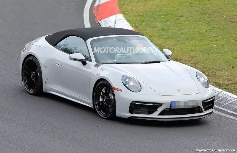 Spy shots and videos of the 2021 Porsche 911 Carrera GTS Cabriolet.