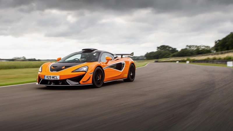 The McLaren 620R gets the MSO R package with titanium exhaust pipes, a roof canopy, and extra carbon fiber