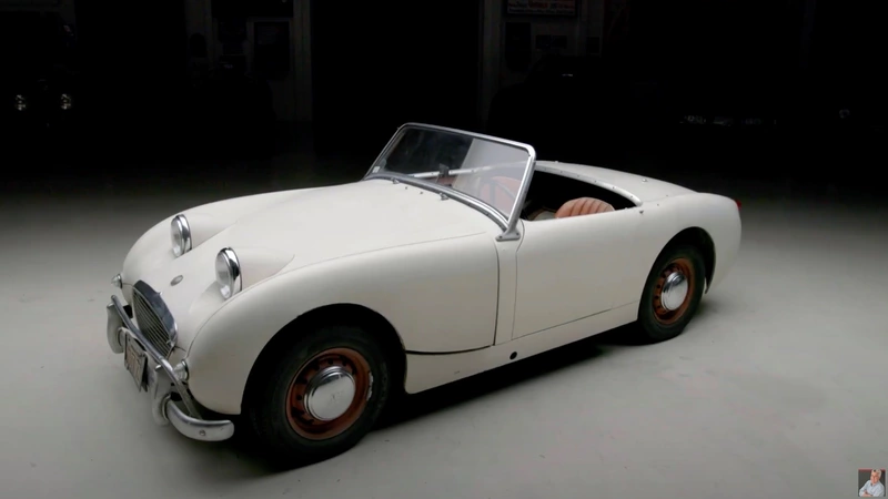 Jay Leno shows off his restored 1959 Austin Healey Sprite automobile.